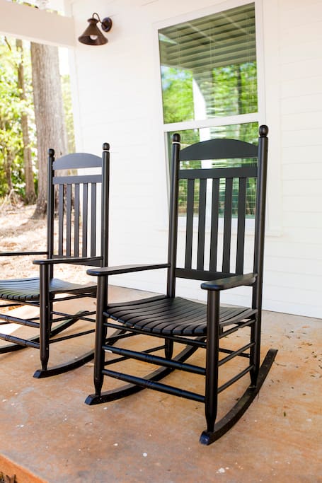 Have a cocktail, enjoy a book from our collection, or play a game of cards on the rocking chair front porch