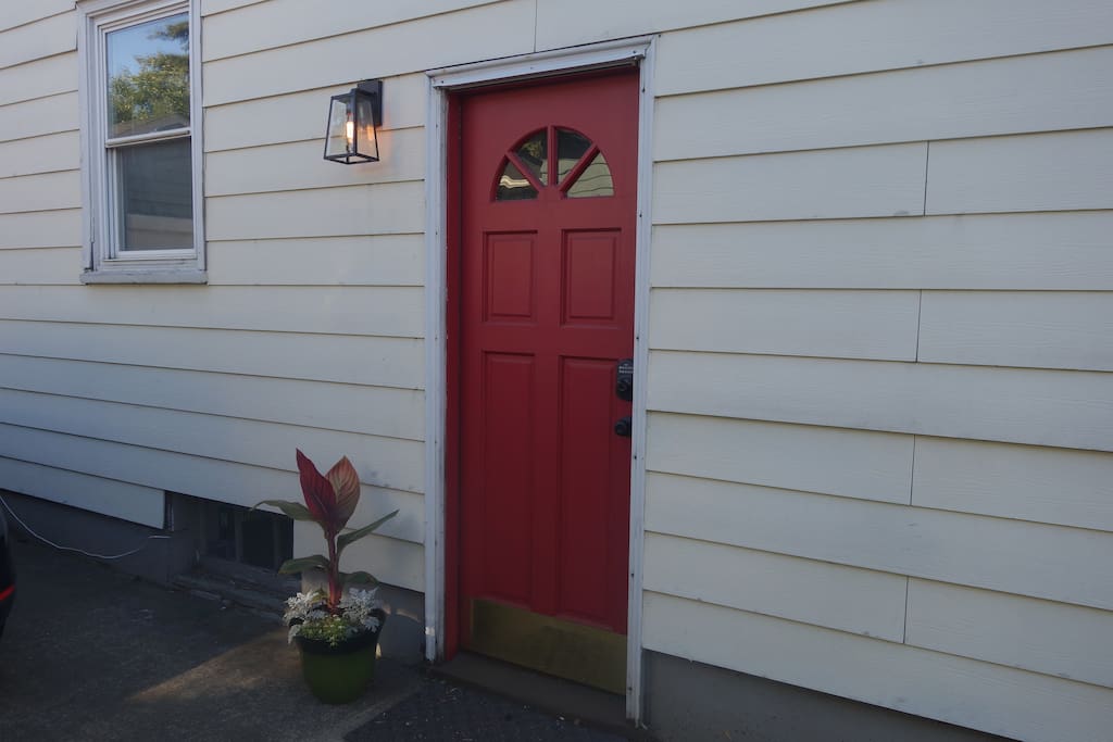 Side entrance - we'll provide you with a code to unlock the door.