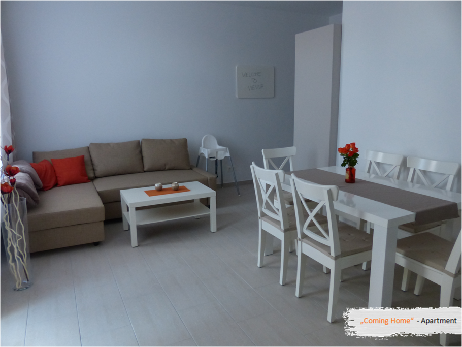 Living room with sofa bed and dinning table