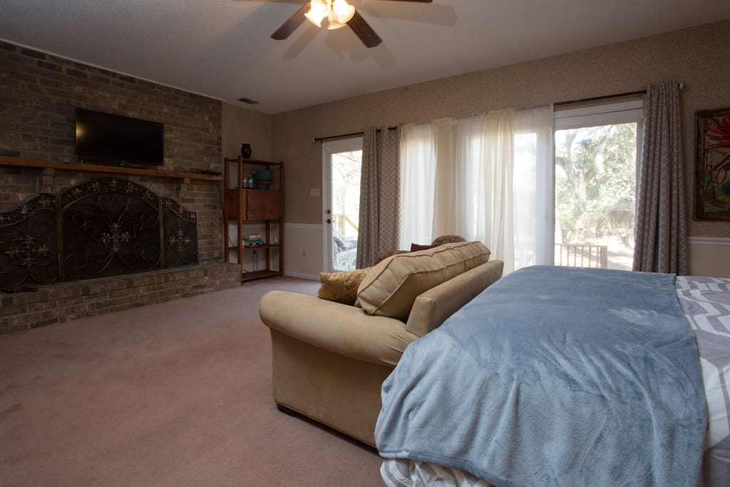 King bedroom 1 downstairs with adjoining deck