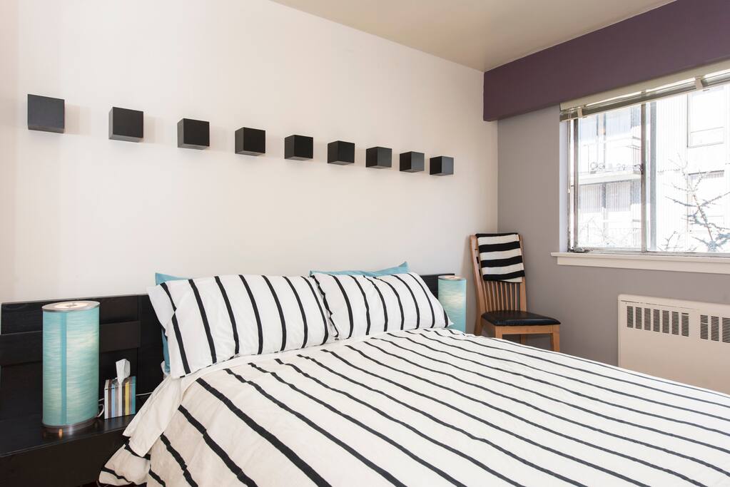 Large Queen bed with a king Duvet