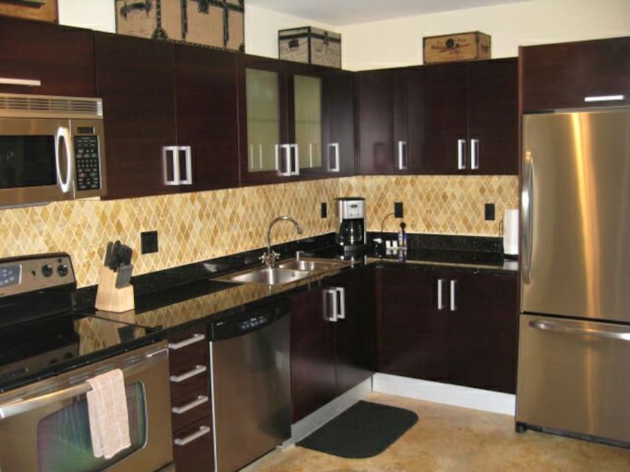 Kitchen area with Granite countertops