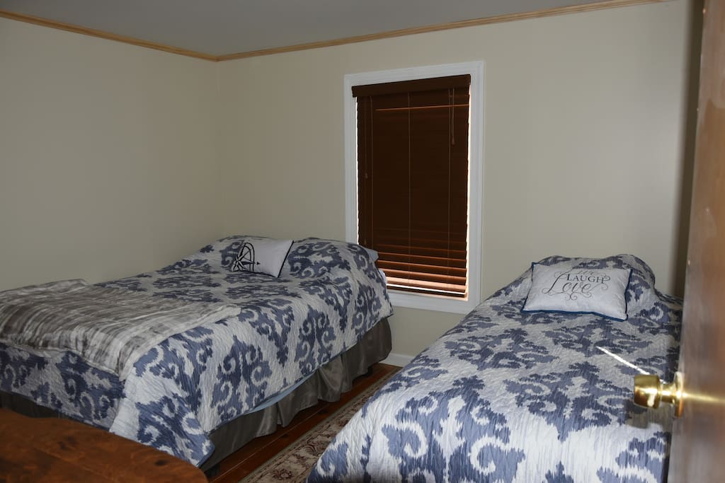 Bedroom#2 has 1 queen size bed and 1 single bed