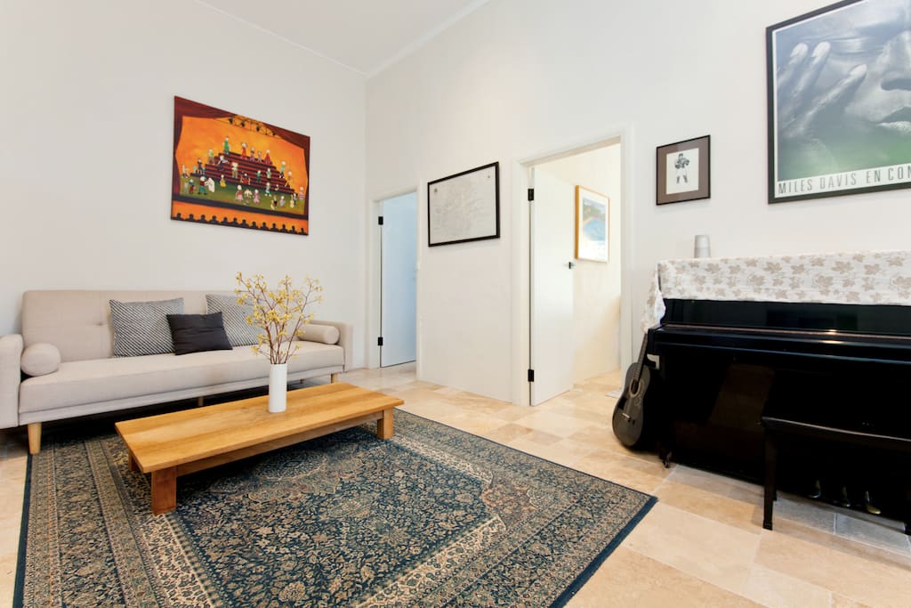 Sofa bed with piano in living room