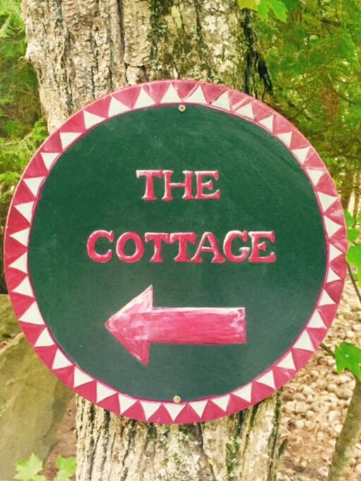 Signs directing you to the Cottage
