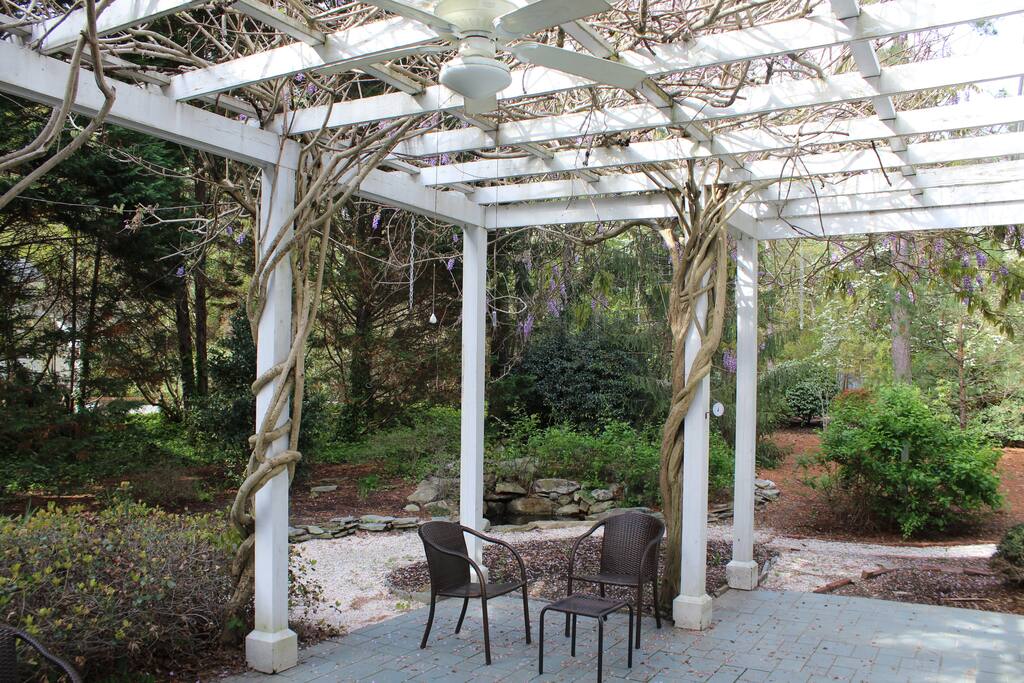 backyard with patio, enjoy the outdoor seats and the grill