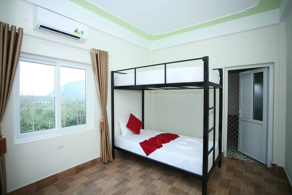 Big Dorm Room with Cover around each Bed