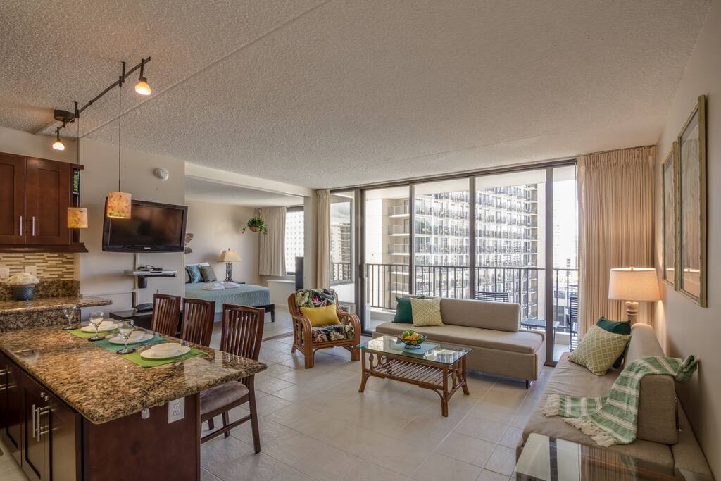 1 Bedroom 1 Bathroom 1 FREE PARKING unit in East Waikiki. The unit can accommodate up to 6 guests. 1 Queen Size Bed & 2 Full Size Sofa Beds. 557 living sqft. & 67 sqft. Lanai(Balcony) over looks city & partiall Ocean View from 15th Floor. Building has great amenities : pool, jacuzzi, BBQ grill, child play ground & tennis court. Very convenient location, a lot of restaurants and stores around. The bus & trolly stops are close by. Few min. walk to the Waikiki Beach!