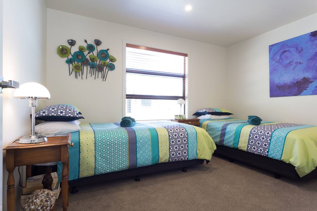 The California King bed can be separated into x2 king single beds for single people travelling together.