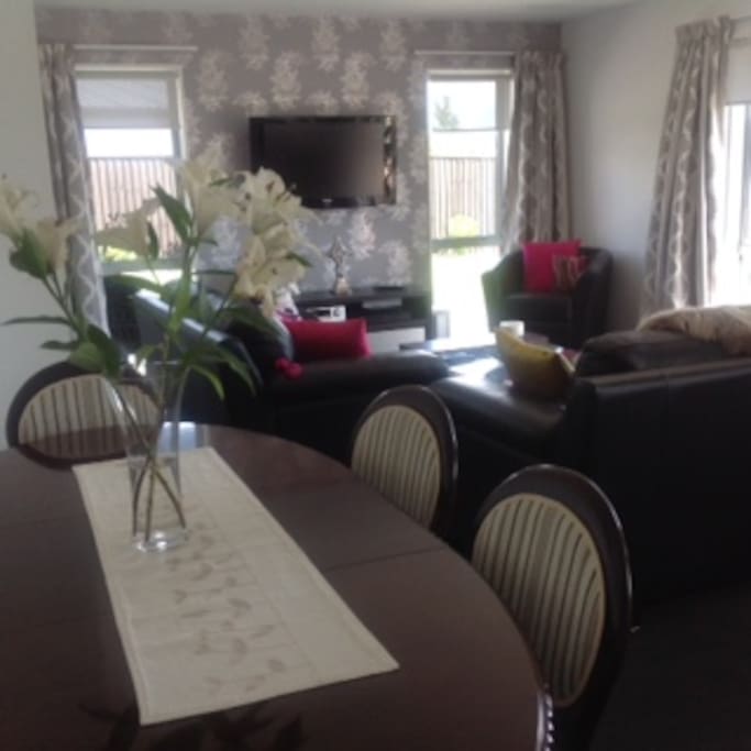 Living Room seating for 6 people, Dining Table, TV, Study nook