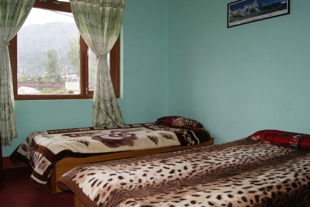 Bedroom photo taken from the door side.