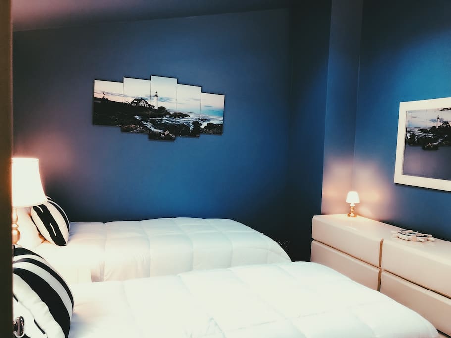 another view of room with dresser and mirror