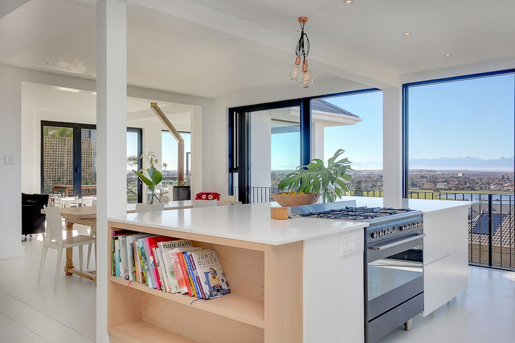Open-plan kitchen with combination gas/electric Smeg Oven. Gorgeous island for entertaining.