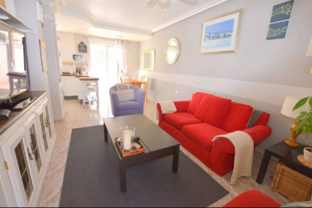 Living area with 42 inch TV. With English tv and also Spanish