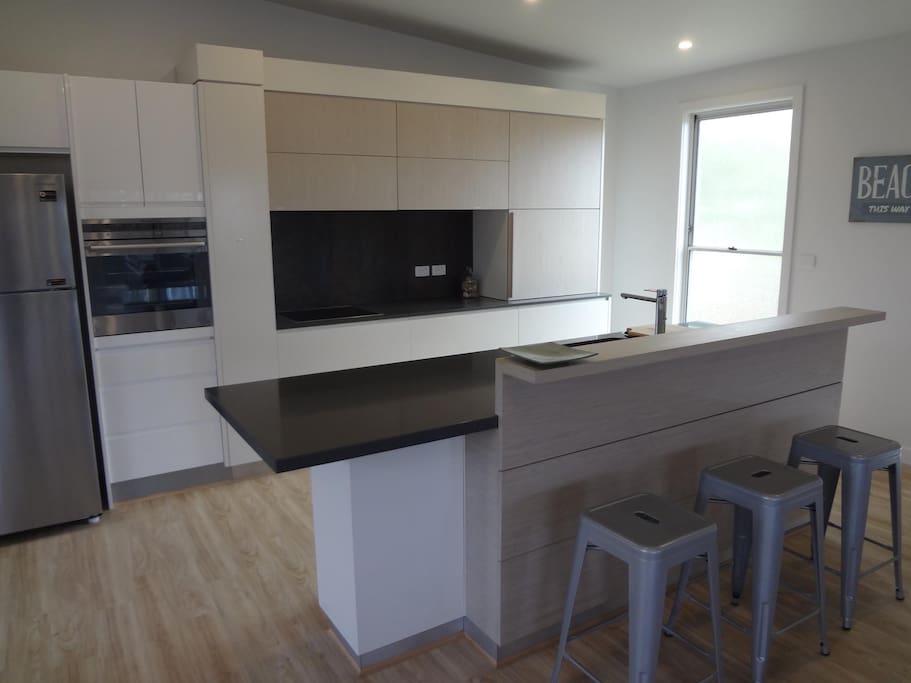 Designer Kitchen with electronic push button doors.