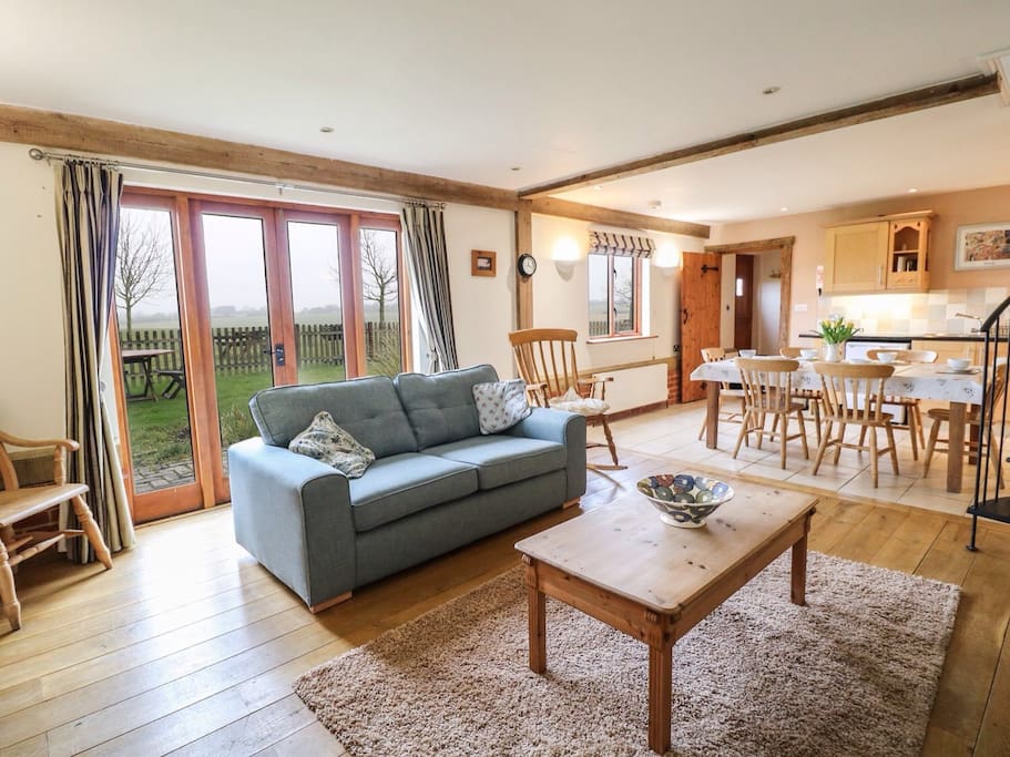 Spacious open plan living area with amazing views over farmland