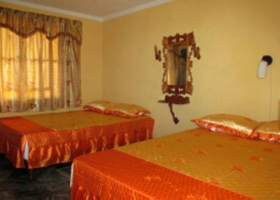1st Bedroom with 2 double bed and a full bathroom