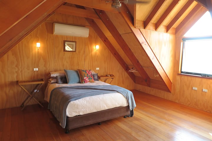 The upstairs loft bedroom