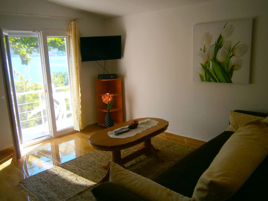 Living room with sofa for three persons