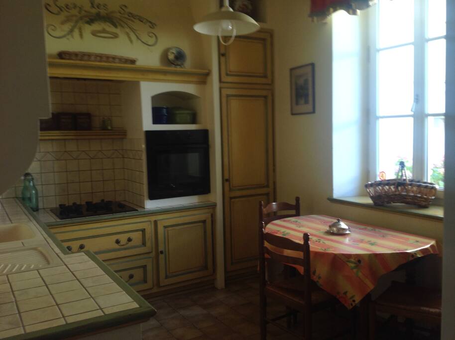gourmet American style kitchen, with an lovely view to the fantastic private back terrace