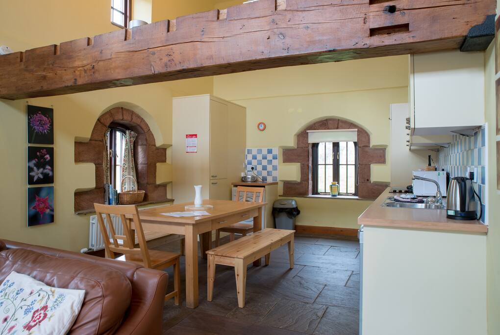 Luxury kitchen with unique oval sandstone Windows.