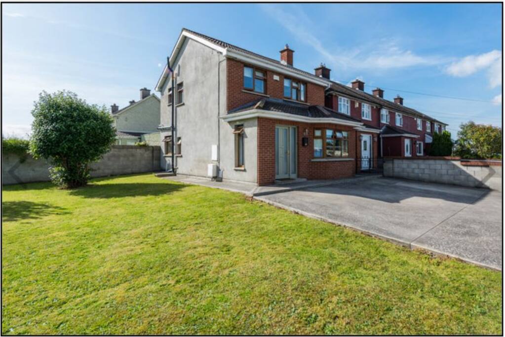 Front of house with parking for two cars