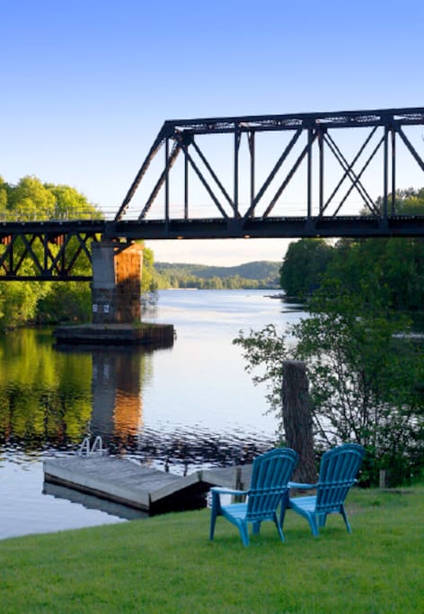 Rustic train bridge over entrance to the bay