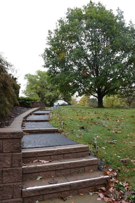 Dedicated parking spot. Paved path to entrance.