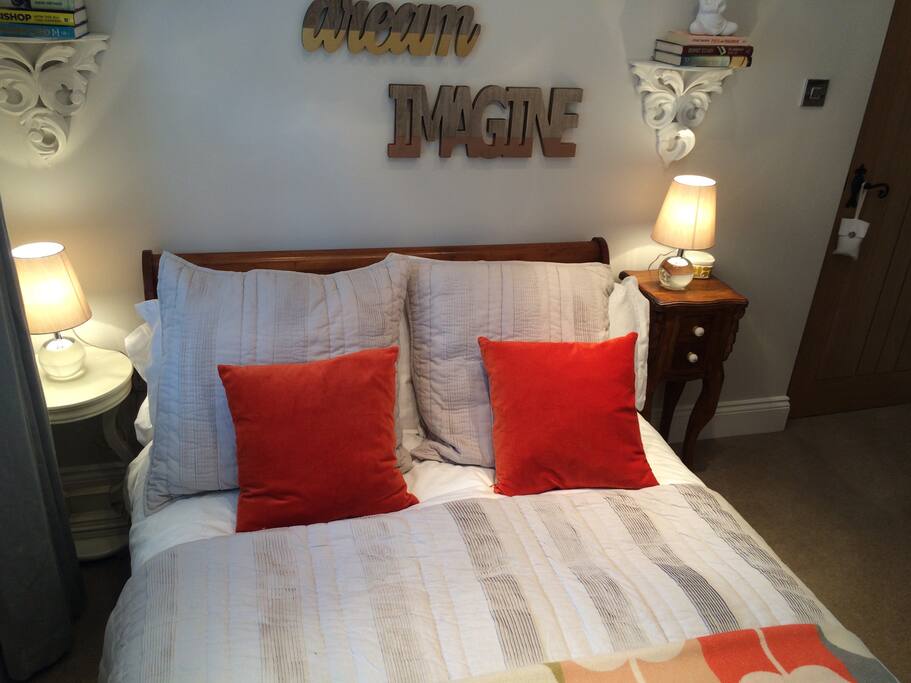 Bedroom with sunny rear garden view