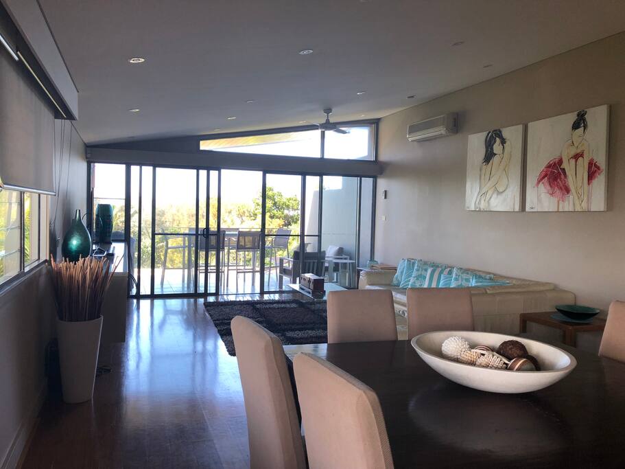 Spacious living area with smart TV