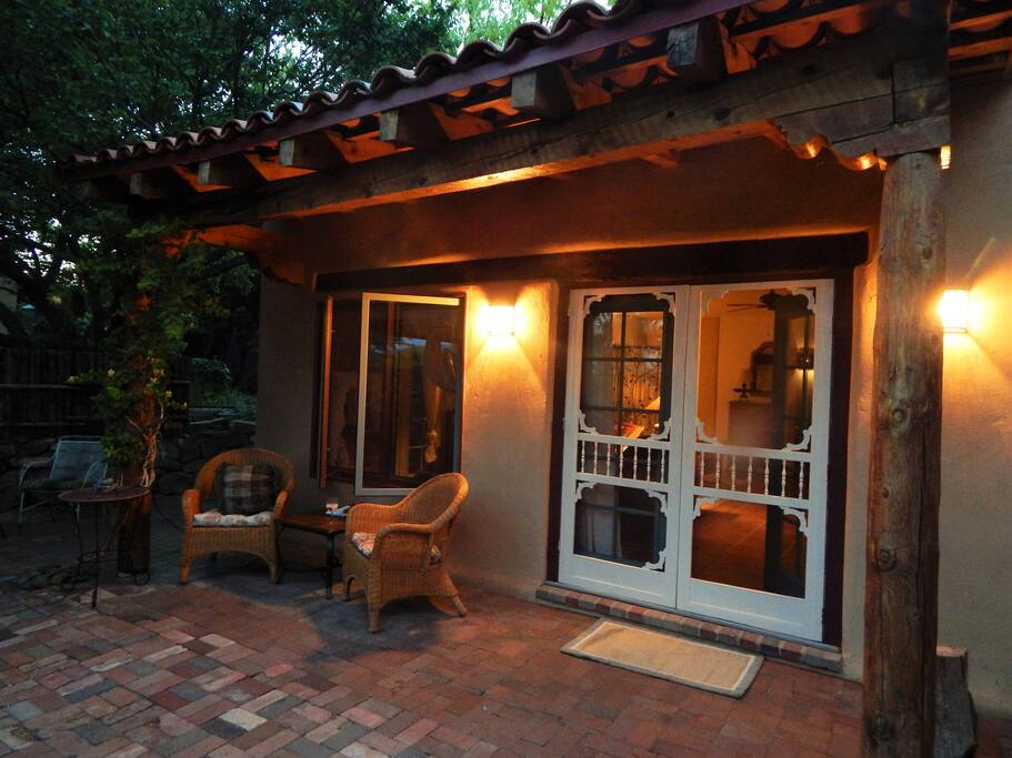Enjoy your brick patio garden surrounded by trees