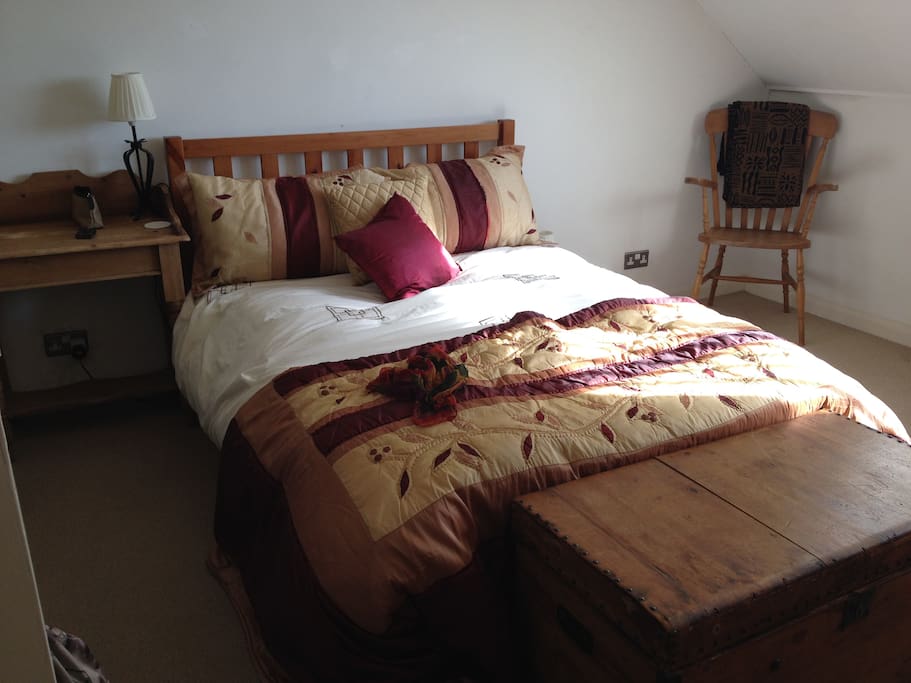 Spacious and cosy master bedroom with plenty of space for a cot