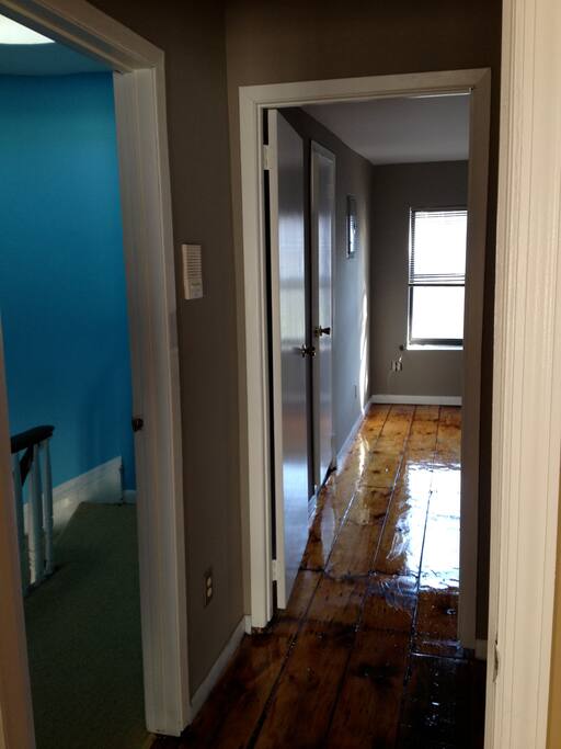 Upstairs hallway between bedrooms.