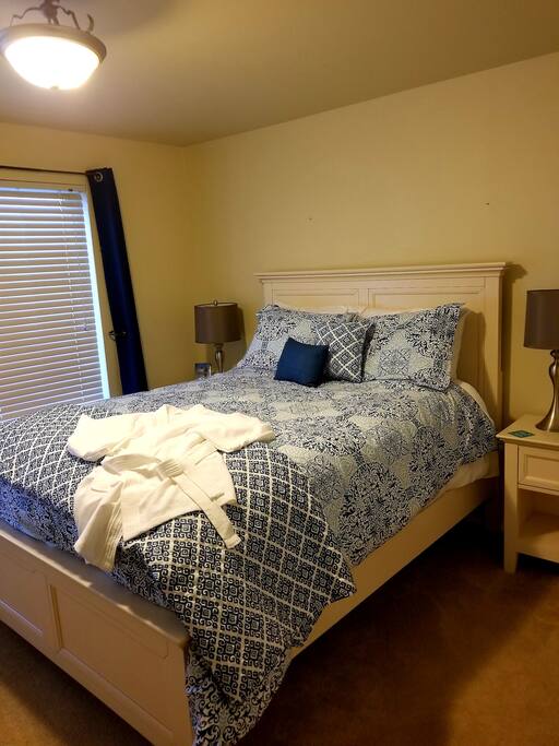 Master Bedroom with attached 3/4 bathroom. View of surf.