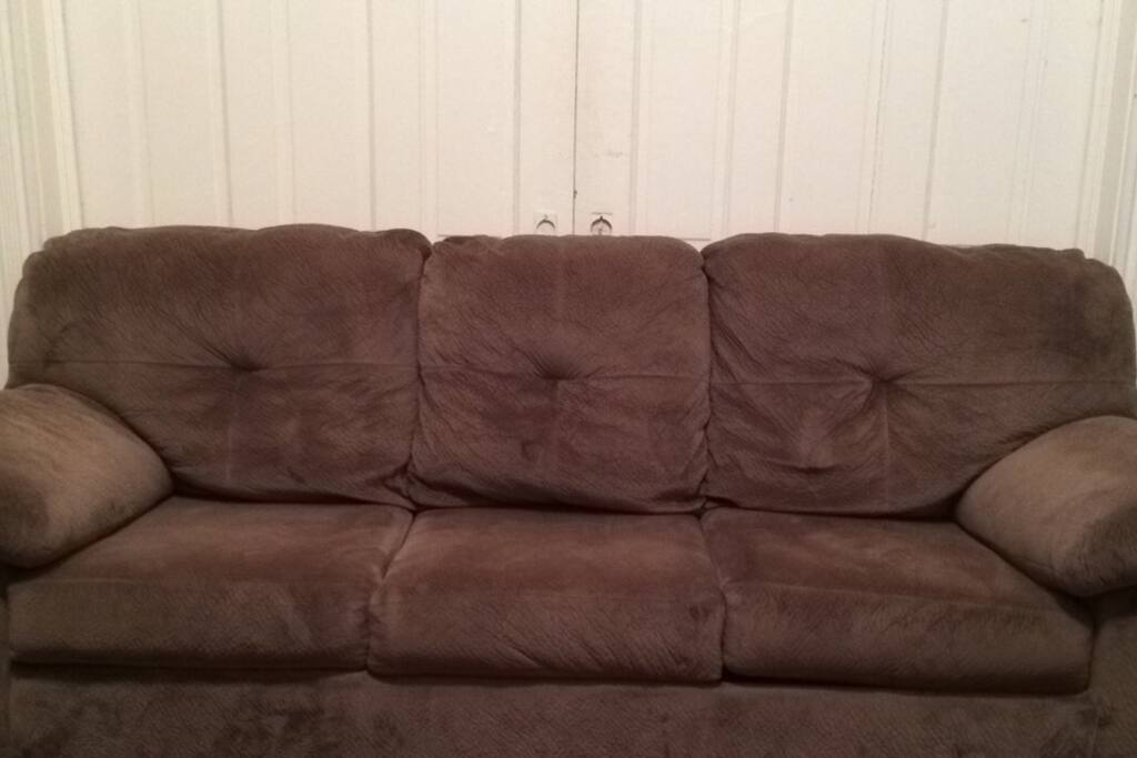 Vintage feathery-feeling fold-out couch. Feels like that scene in The Lion King when Simba is sleeping on Mufasa's belly