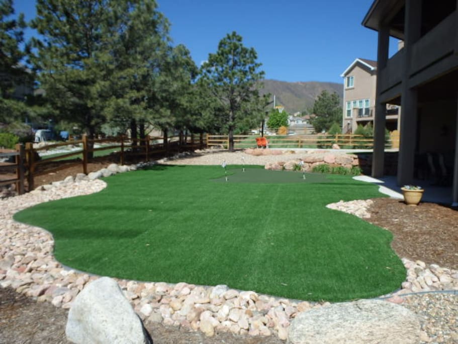 Artificial turf with putting green and chipping area
