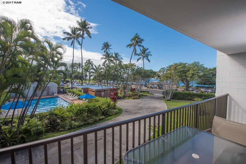 The ocean view from our lanai, you will be on the beach in under a minute!