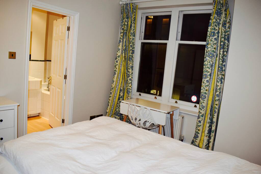 There is a desk in case you need to do some work.
As you see you are the only one who can access the en-suite bathroom so no need to wait in the morning.
