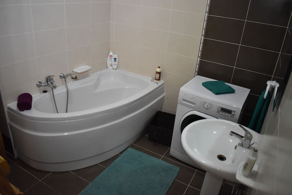 This is your bathroom with a nice big bath tub and washing machine access, your bathroom is shared with one other room.