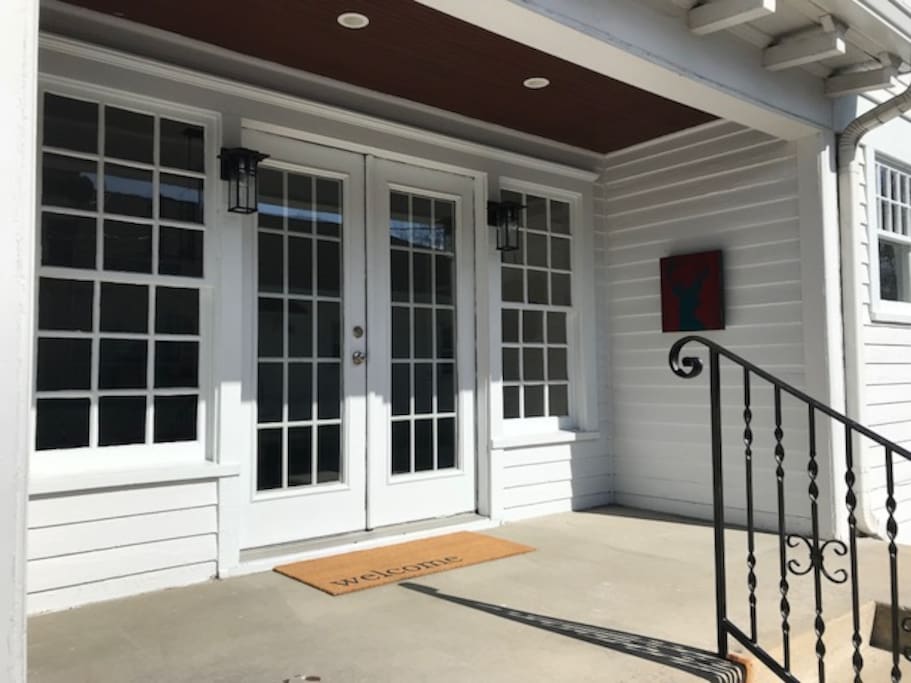 The side entrance is directly off the driveway and accesses the dining room.