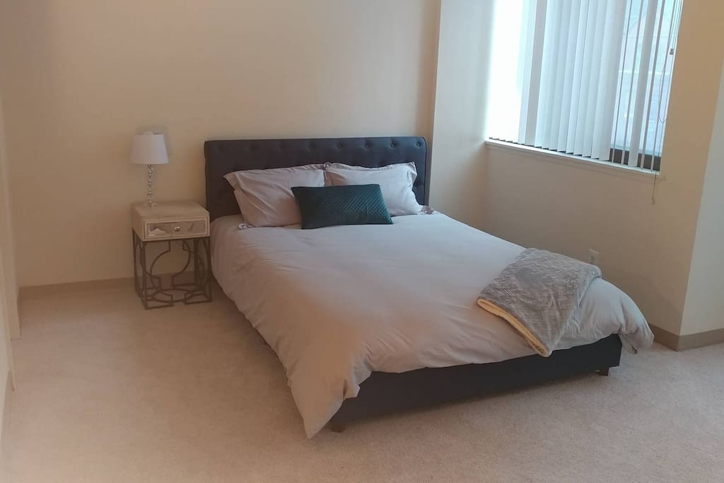Queen sized bed with brand new memory foam mattress