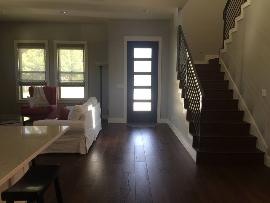 Stairs to the work area, two guest rooms, and full bath.