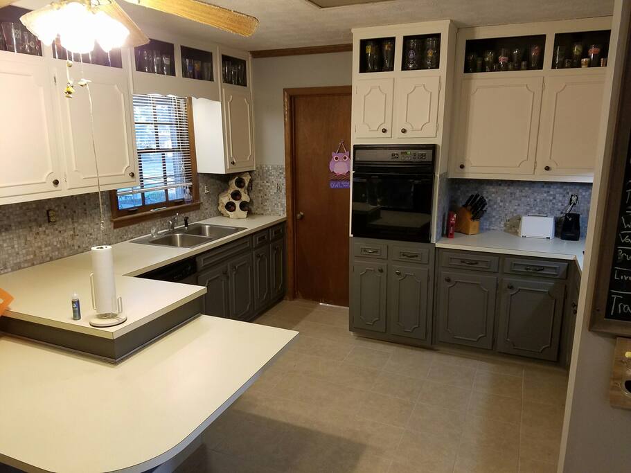 Common kitchen. There is a microwave and a toaster oven. Also to the right there’s a stove top