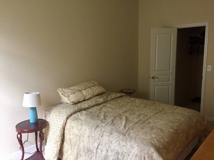 Full size bed. Large walk in closet