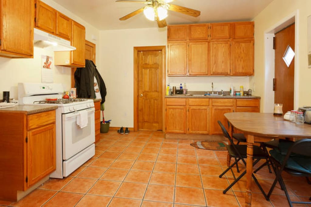 Eat-in Kitchen. Perfect for breakfast or brunch prep with backyard patio access.