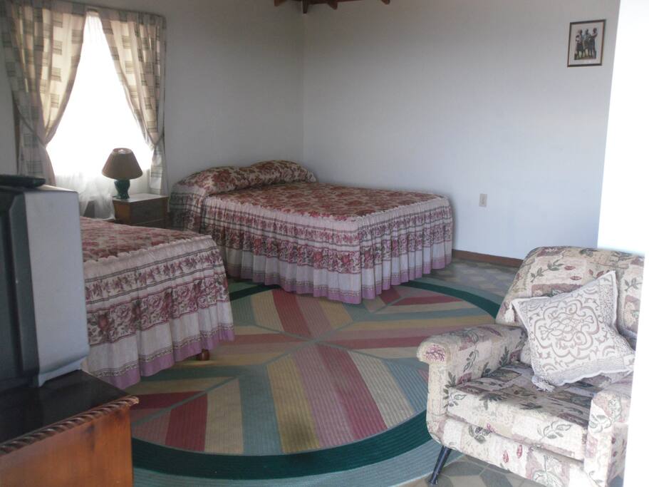 Room with two double beds