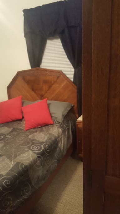 Guest bedroom with beautiful antique furniture