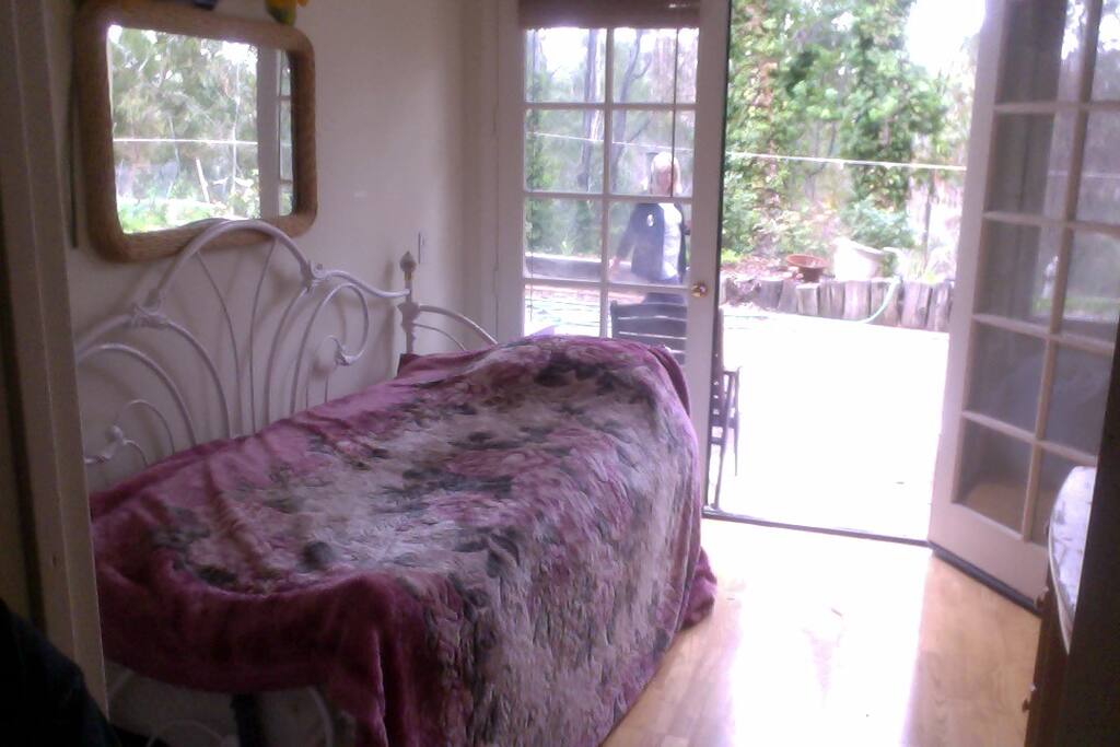This peaceful, serene room leads to a beautiful garden and canyon trail that goes on for miles.