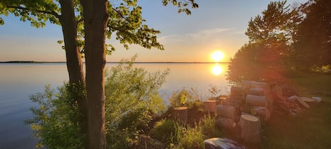 Cozy sunset lake cabin.