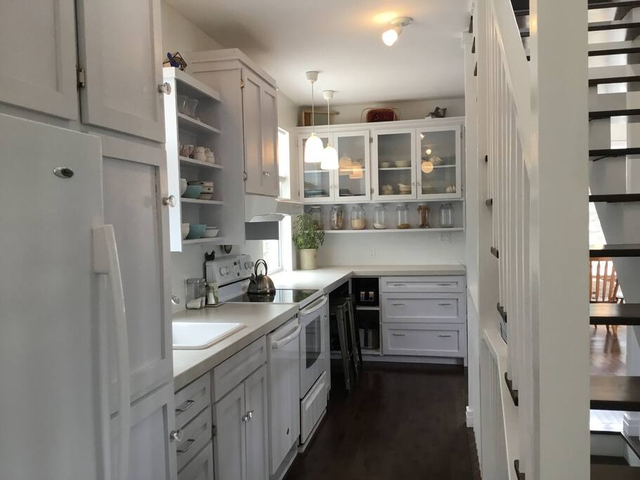 Main Floor Kitchen, with breakfast counter and two stools, 9' ceilings